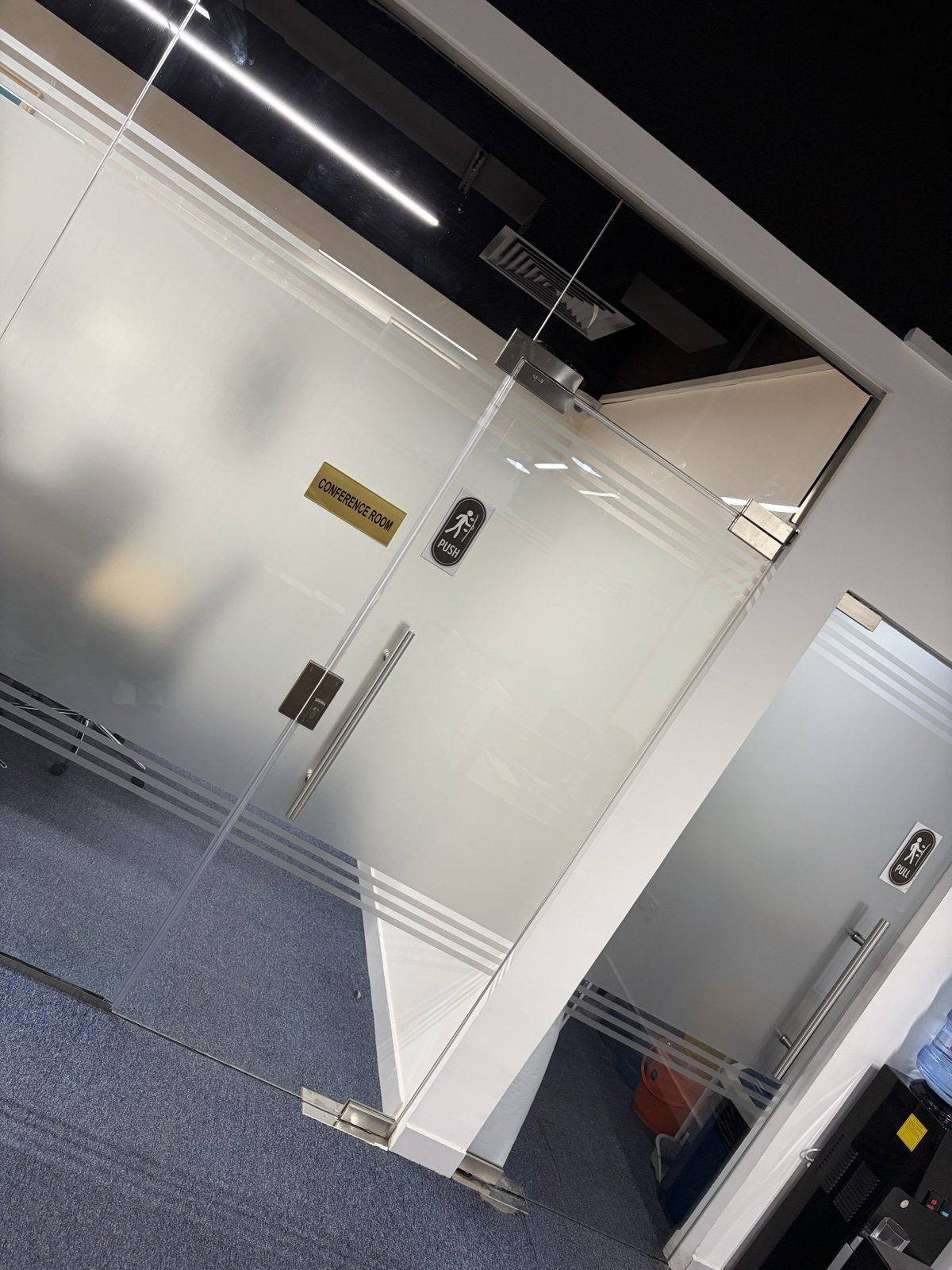 FishMarket.ai glass office partition and interior workspace
